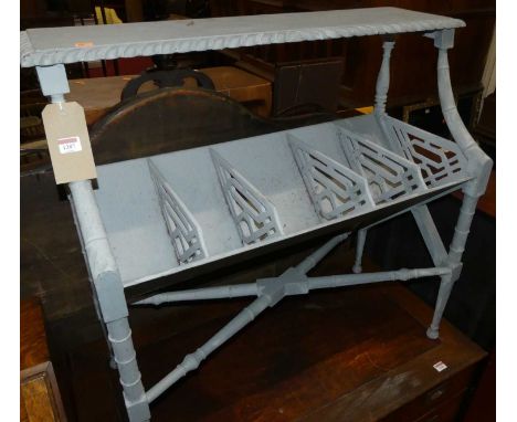 A painted five division book trough, raised on turned and square cut supports, width 87.5cm