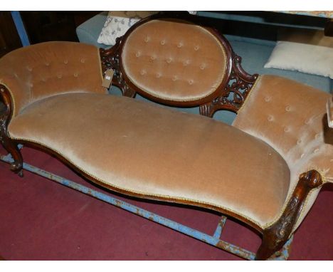 A mid-Victorian floral carved and mahogany framed three-seater salon sofa, having buttoned dralon upholstery, width 190cm