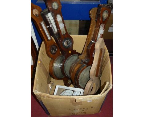 A collection of six partially complete 19th century wheel barometers, together with a further stick barometer, aneroid barome