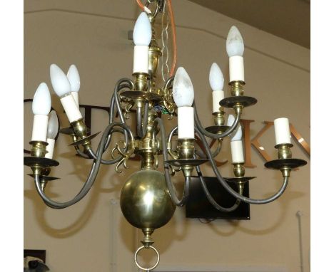 A Dutch style brass hanging 12-light electrolier, approx drop 65cm