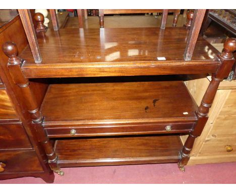 A 19th century mahogany three-tier buffet whatnot, having single central drawer, width 91cmHeight 98cm, depth 47cmNo signs of