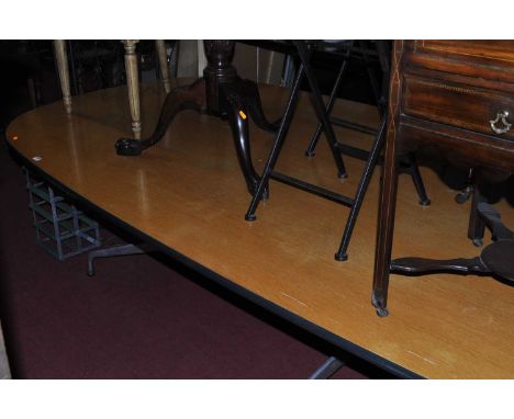 Charles &amp; Ray Eames probably for Vitra, a long boardroom table, the apparently replacement light oak top of curved oval f