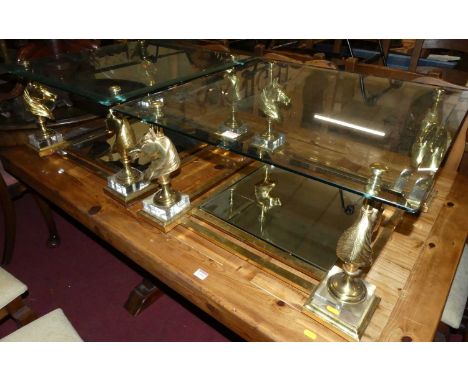 A pair of contemporary gilt brass and heavy bevelled glass topped low square occasional tables, each with mirrored glass lowe