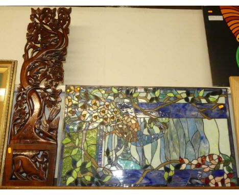A modern lead light, 50x88cm; together with eastern carved and pierced hardwood panel 100x25cm