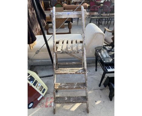 A PAIR OF VINTAGE THREE RUNG SMALL WOODEN STEP LADDERS 
