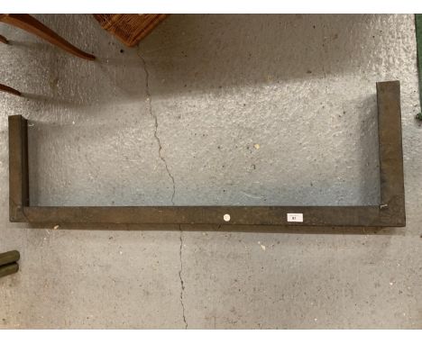 A VINTAGE METAL FIRE FENDER 
