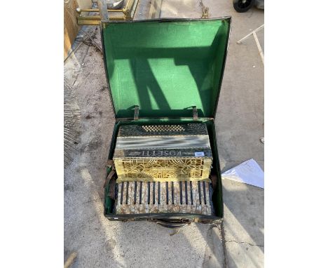 A VINTAGE AND DECORATIVE ACCORDIAN 