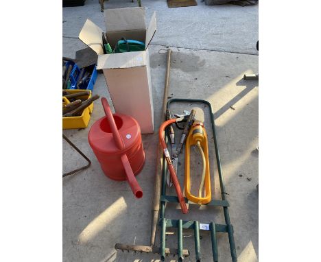 AN ASSORTMENT OF GARDEN TOOLS TO INCLUDE SHEARS, BOW SAW AND SPRAYER 