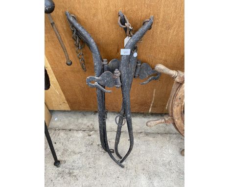 FOUR VINTAGE WORKING HORSE HARNESS ATTATCHMENTS 