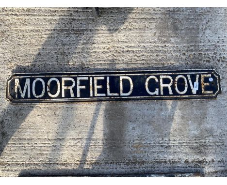 A VINTAGE CAST IRON 'MOORFIELD GROVE' ROAD SIGN 