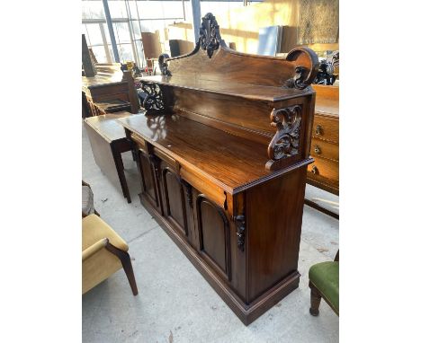 A VICTORIAN STYLE CHIFFONIER WITH THREE FRIEZE DRAWERS AND THREE PANELLED DOORS TO THE BASE, RAISED BACK PANEL WITH SHELF, 65