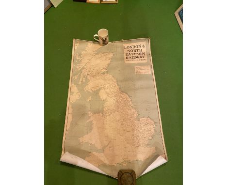 A VINTAGE PAPER LAID ON CANVAS MAP OF 'LONDON AND NORTH EASTERN RAILWAY AND CONNECTING RAILWAYS' 