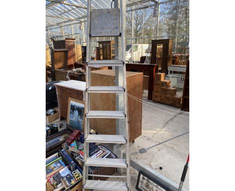 A SIX RUNG ALUMINIUM STEP LADDER 