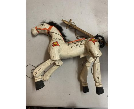 A VINTAGE PAINTED WOODEN STRING PUPPET IN THE FORM OF A HORSE 