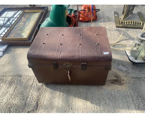 A VINTAGE TIN TRUNK 