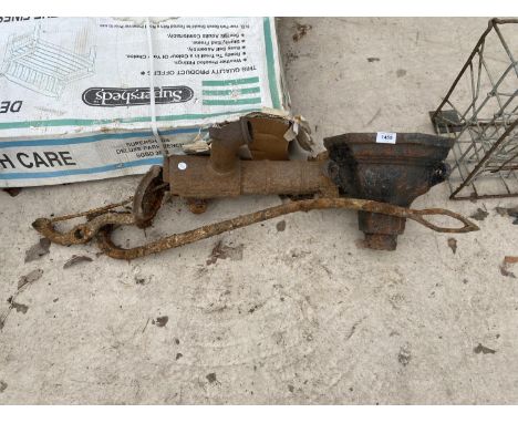 A CAST IRON DOWN SPOUT HOPPER AND A FURTHER VINTAGE WATER PUMP 