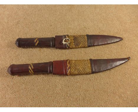 TWO AFRICAN KNIVES 20CM BLADES WITH LEATHER GRIPS AND SCABBARD 