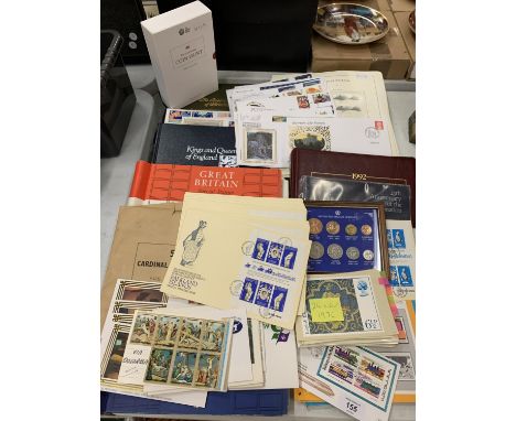 A LARGE QUANTITY OF WORLD STAMPS TO INCLUDE TWO BOOKS OF FIRST DAY COVER STAMPS 'THE TWELVE DAYS OF CHRISTMAS' AND 'THE KINDS