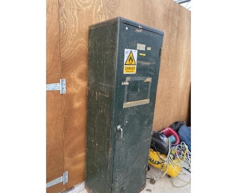 A LARGE VINTAGE METAL STORAGE CUPBOARD 