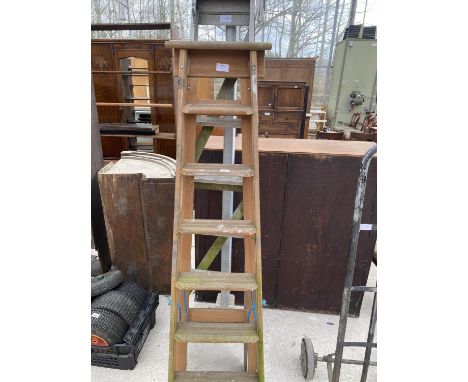 A VINTAGE 6 RUNG WOODEN STEP LADDER AND A FURTHER 6 RUNG ALUMINIUM STEP LADDER 