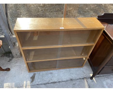 A LIGHT OAK BOOKCASE, 36" WIDE 
