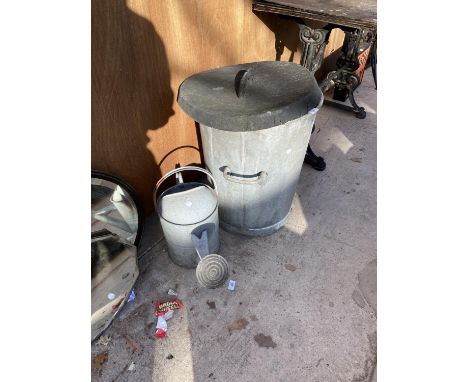 A VINTAGE METAL DUSTBIN AND A FURTHER VINTAGE WATERING CAN 