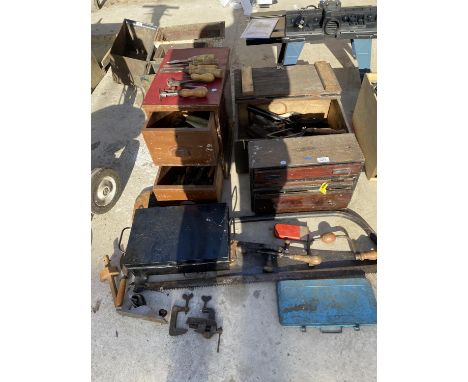 AN ASSORTMENT OF VINTAGE TOOLS TO INCLUDE A BOW SAW, THREE TOOL CHESTS AND A DEED BOX ETC 