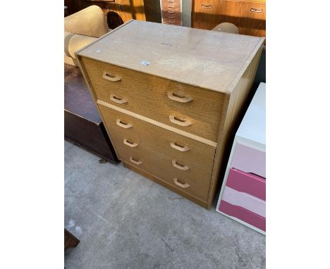 A LIGHT OAK G-PLAN E-GOMME CHEST OF FIVE DRAWERS, 30" WIDE 
