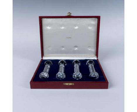 A set of 4 clear facetted crystal tableware in a barbell shape. This item has its original box: 9"L x 6.5"W x 1.75"H. Issued: