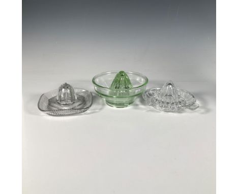 A collection of three reamers, one in a lovely green hue and two in clear glass with a cut glass design. Largest item: 5.5"W 