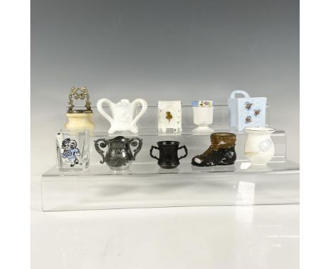 A set of 10 toothpick holders, including a white square one with gilded accents, a milk glass tyg, a vase shaped holder with 