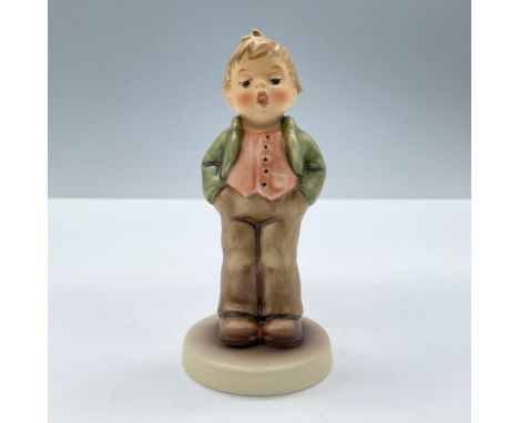Features a lovely singing boy in green, brown and red clothes. M. I. Hummel inscribed on base. Goebel backstamp. This item ha