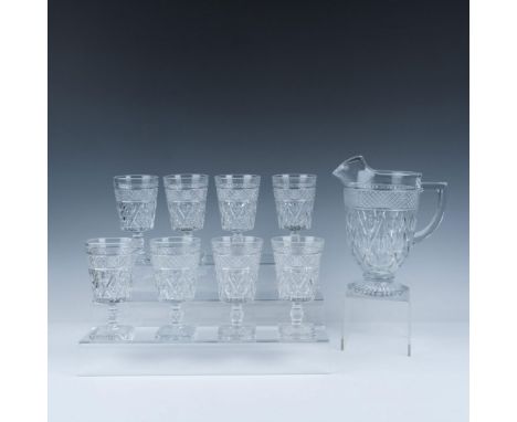Vintage pressed glass beverage set featuring a elegant set of 8 glasses; measures: 6.25"H x 3.5" dia. And 1 large pitcher; me