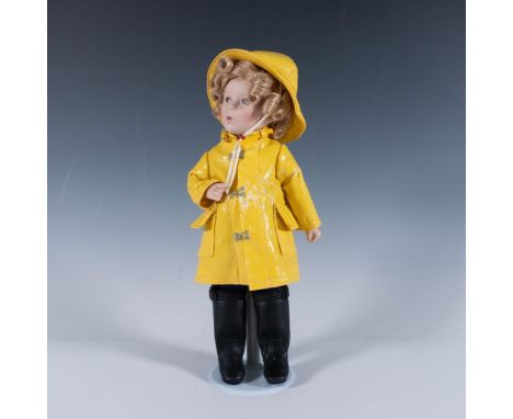Porcelain hand painted face and head dressed in re-creation of the original costume. This item has its original box that meas