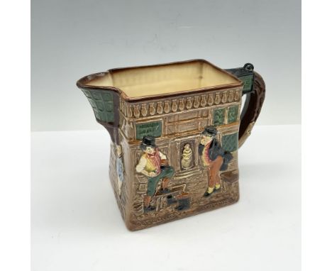Glossy porcelain pitcher with high relief images of characters and settings from the Pickwick Papers novel by Charles Dickens