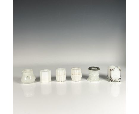 Set featuring various shaped holders. Dimensions of the largest item: 2.75"H x 2" dia. Dimensions: See DescriptionCondition: 