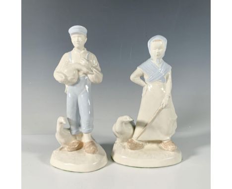 A delightful pair of glossy white and sky blue figurines showcasing a male farmer in overalls holding a goose, accompanied by
