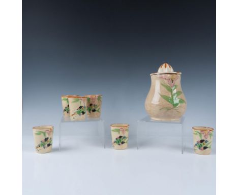 Delightful hand-painted pitcher with a juicer reamer top, featuring a raised relief design with a charming bird and flower mo