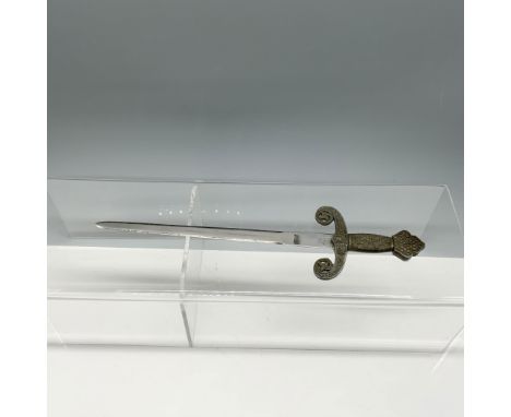 Amazing paper knife surely to impress all other desktop tools. Toledo marking on base of blade. Dimensions: 9.75"L x 2.5"WMan