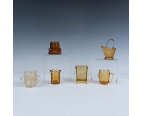 This charming collection includes six toothpick holders, a handled basket, a rustic handled barrel mug, a barrel with two bus