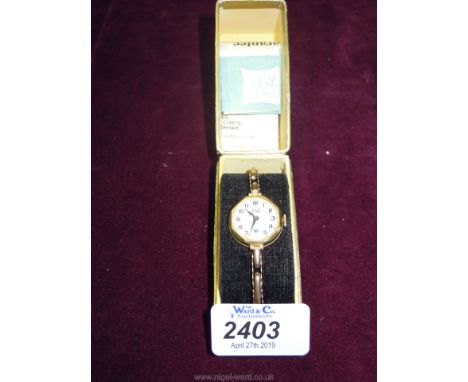 A presentation cased 9ct Gold ''Smiths Astral'' 15 jewels lady's Wristwatch with inset second dial and expanding bracelet, ap