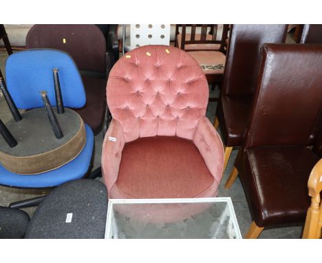 A pink upholstered button back chair together with a red painted seat of a chair (lacking back) 