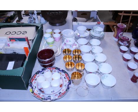 A quantity of Aynsley cups and saucers, Royal Albert cup and saucer, green floral decorated teaware etc.