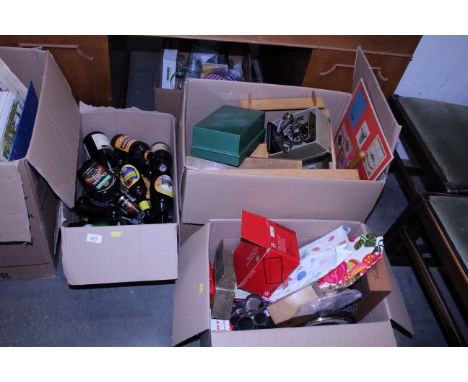Three boxes of various sundries to include glass bottles, scales, mantel clock, guillotine etc 