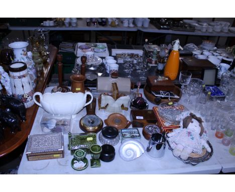 A stoneware hot water bottle; a pair of wooden candle sticks; a wooden bowl; a mother of pearl inlaid trinket box; glass roll