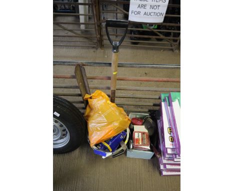 A box of various hand tools; digging fork; wooden clamp; various quick release clamps; a Ford headlight; an engine starter an