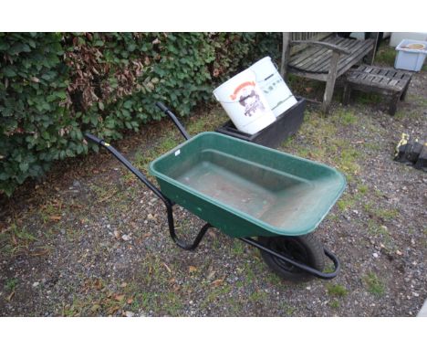 A light weight plastic and metal wheel barrow