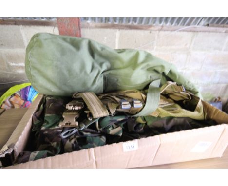 A quantity of camouflage Army clothing, waistcoats etc.