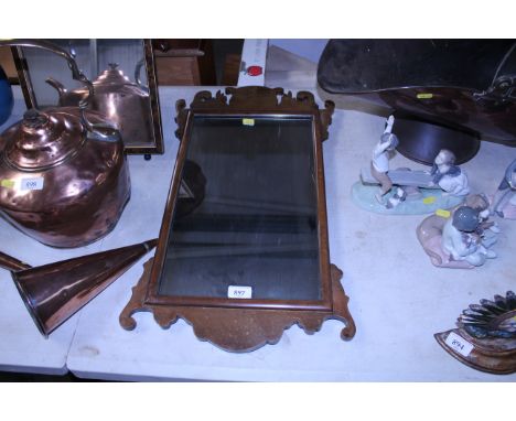 A Chippendale style wall mirror 