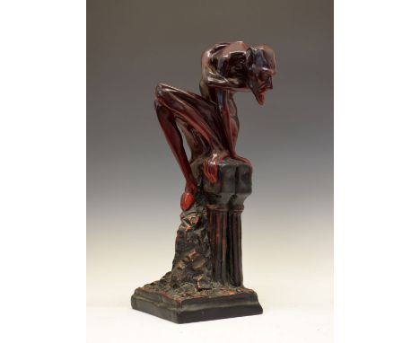 Unusual large early to mid 20th Century earthenware figure of devil, modelled seated atop a pedestal and columns on integral 